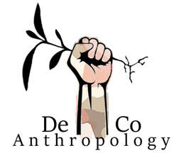 New De-Co logo of raised hand holding an olive branch